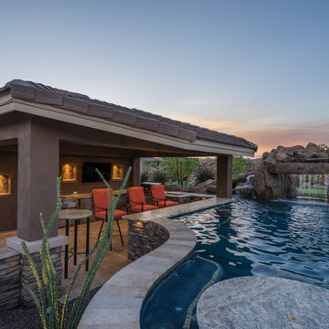 Natural Stone Freeform Pool + Perimeter Overflow Spa