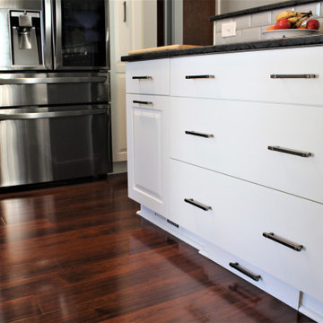 Showplace EVO Kitchen in Sierra Extra White w/ Slab Drawer Headers