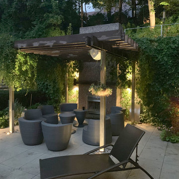 Infinity pool, patio, and landscape lighting in Toronto