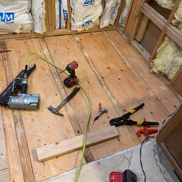 ADA Bathroom/Garage Retrofit and New Flooring
