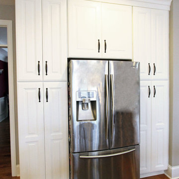 White Kitchen with Espresso Island and Eternia Caringdale Quartz Countertop