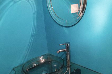 Minimalist master white tile and porcelain tile marble floor drop-in bathtub photo in DC Metro with glass countertops