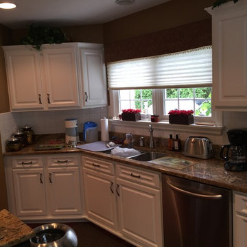 cabinet refacing--2 toned white with chocolate island and bar area