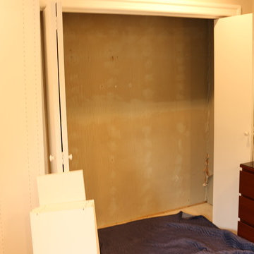 Reach-in Closet with Backing to cover up Damaged Wallpaper