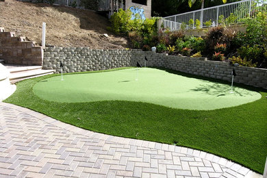 This is an example of a large traditional backyard outdoor basketball/tennis/multi-game court in San Francisco.