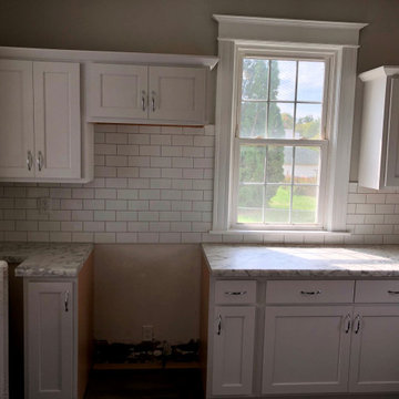 Geneseo, IL Quick House Flip-Painted White Cabinets Wilsonart Marmo Bianco