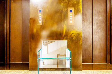 Huge minimalist entryway photo in Miami