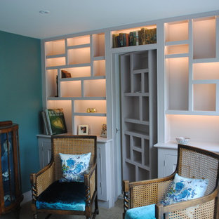 Design ideas for a modern home office and library in Other.