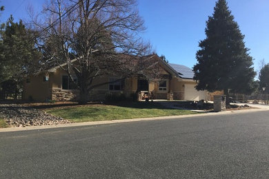 Example of an arts and crafts exterior home design in Denver