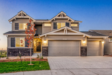 Large arts and crafts beige three-story stucco house exterior photo in Denver with a shingle roof