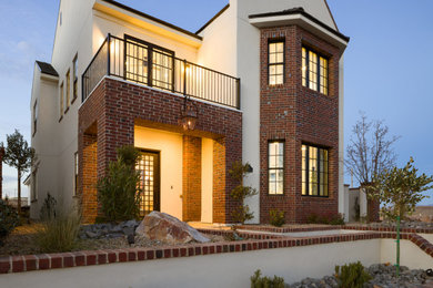 Example of a french country exterior home design in Salt Lake City