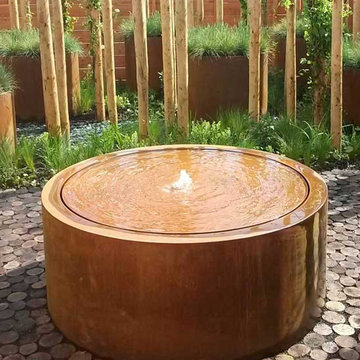 Gartenbrunnen rund aus Cortenstahl