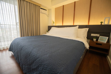 Example of a danish bedroom design in Other
