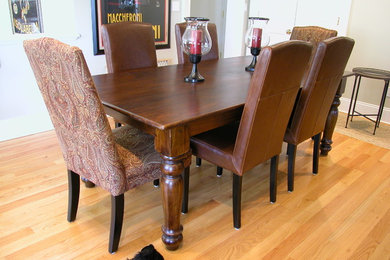 Mid-sized elegant light wood floor enclosed dining room photo in New York with beige walls and no fireplace
