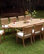 11-Piece Outdoor Teak Dining Set, 117" Extension Oval Table, 10 Giva Arm Chairs