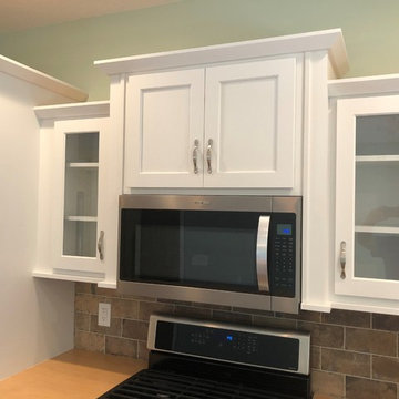 New Construction Milan, IL Koch Express Painted White Formica Amber Maple