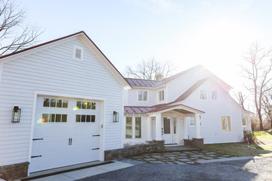 Inspiration for a farmhouse exterior home remodel in DC Metro