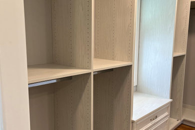 Walk-in closet - mid-sized contemporary walk-in closet idea in Boston with shaker cabinets