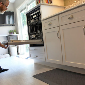 Alpha, IL White and Gray Kitchen with Hidden Laundry and Raised Dishwasher