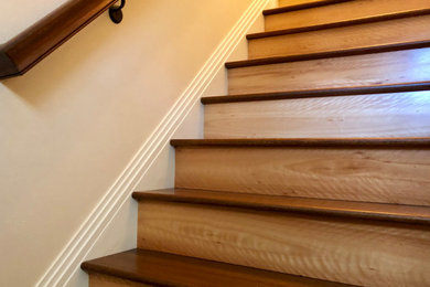 Staircase - mid-sized modern wooden straight wood railing staircase idea in New York with wooden risers