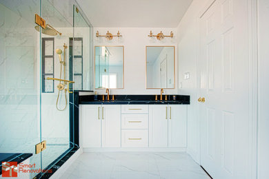 Bathroom - modern master double-sink bathroom idea in Toronto with shaker cabinets, white cabinets, quartz countertops, black countertops and a built-in vanity