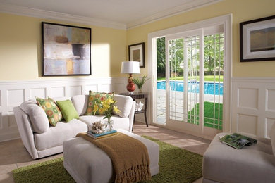 Inspiration for a mid-sized timeless formal and enclosed ceramic tile and brown floor living room remodel in Detroit with yellow walls