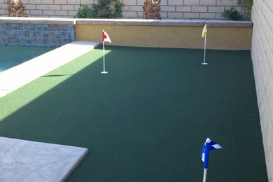 Photo of a small traditional partial sun backyard landscaping in Los Angeles.