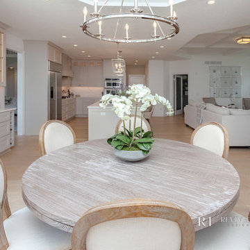 Elegant Round Dining Room with Chrome Chandelier