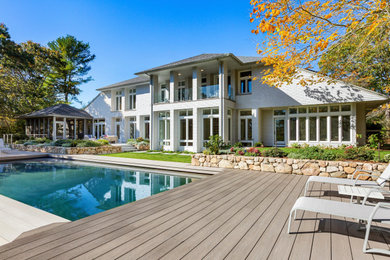 Inspiration for a large modern gray two-story wood and shingle house exterior remodel in Boston with a shingle roof and a gray roof