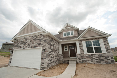 Example of an arts and crafts exterior home design in Chicago