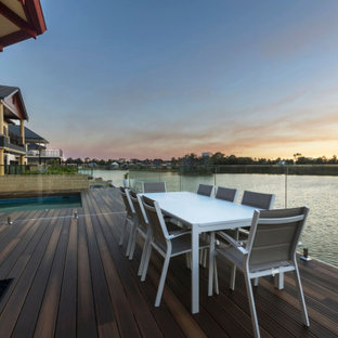 Photo of a contemporary deck in Portland Maine with no cover.