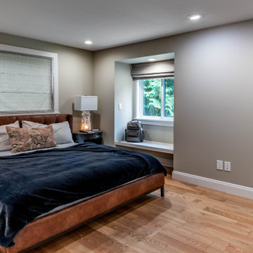 Spacious Gray Bedroom with Seating Area