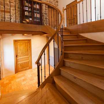 Escalier à la française deux quartiers tournants en Chêne débillardé