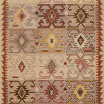 Momeni - Momeni Nomad Hand Knotted Traditional Area Rug Rust 8' X 11' - The tribal design of the Nomad captures the essence of boho chic. Inspired by ancestral area rug motifs, traditional diamond and dot symbols fill the ornamental field and decorative border with a repeating geometric pattern in a vivid color palette. Each rug is embellished with tassels of fringe that enhance the assortment's global elements. Hand knotted from 100% natural wool fibers, the free-spirited style looks luxe when placed as a featured floorcovering at the center of the room or layered in a casual arrangement beneath coffee tables and chairs.
