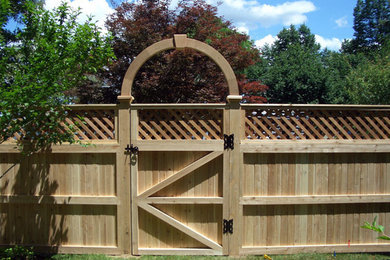 This is an example of a mid-sized craftsman full sun backyard formal garden in Boston.