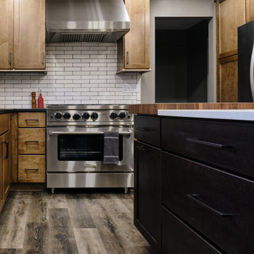 Stainless steel appliances and wood tones