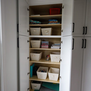 Floor-to-Ceiling Built-In Cabinetry Wall