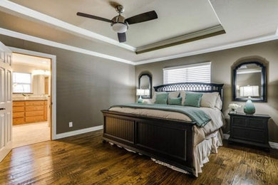 Example of a country bedroom design in Dallas