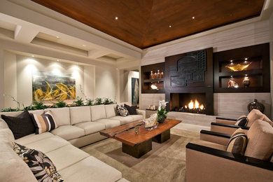 Design ideas for an expansive contemporary living room in San Diego with beige walls, a standard fireplace and no tv.