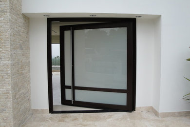 Custom pivot iron doors