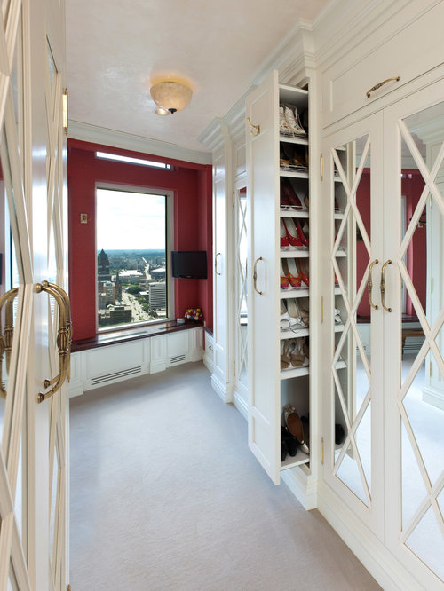 Best Pull-Out Shoe Storage Design Ideas & Remodel Pictures | Houzz - Photo of a mediterranean dressing room in Milwaukee.