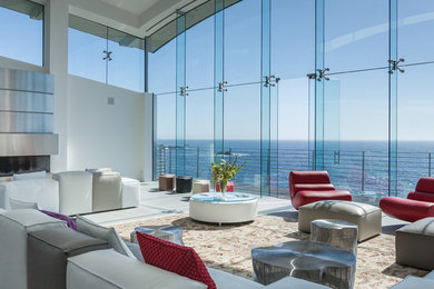 Living room - large modern open concept concrete floor living room idea in San Francisco with white walls, a standard fireplace and a metal fireplace