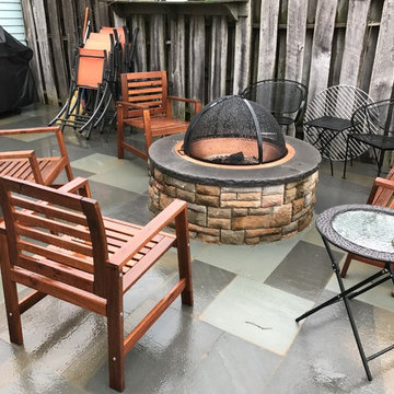 Removal of existing deck-Replaced with flagstone and E.P Henry Cast Wall