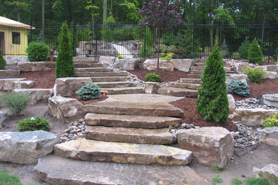 Inspiration for a craftsman drought-tolerant and full sun backyard stone garden path in Toronto.