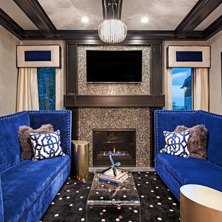 Home theater - mid-sized transitional enclosed home theater idea in Cleveland with gray walls and a wall-mounted tv