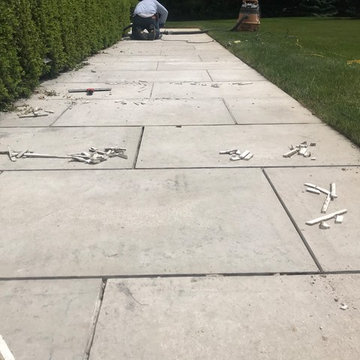 Carefully grinding out deteriorated mortar joints