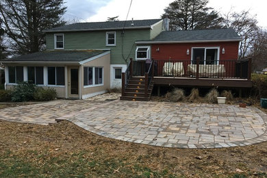 Composite deck with paver patio