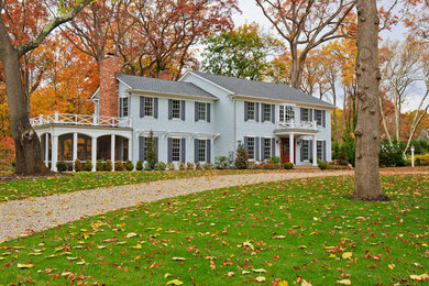 Traditional two-story wood exterior home idea in New York