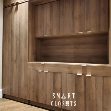 Master Walk In and Wall Unit Closet in Esterel Finish Designed by Smart Closets