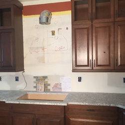 Colorful nature stone herringbone pattern backsplash before picture - Products
